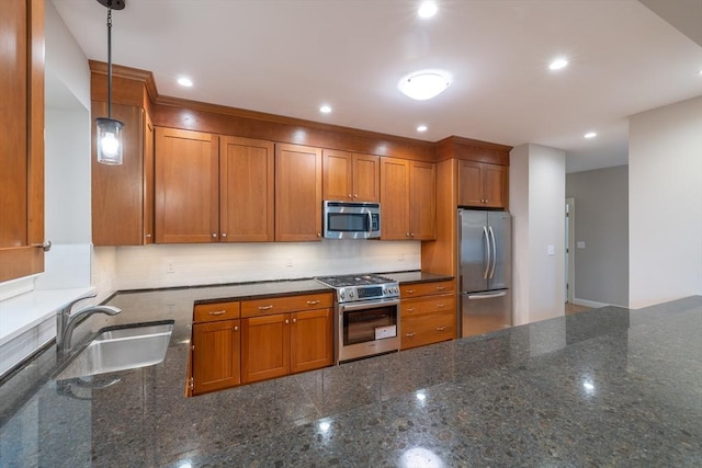 108 Johnson Woods Unit 108, Reading, MA 01867 - kitchen with stainless steel appliances, brown cabinetry, backsplash, and recessed lighting