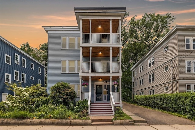 63-65 Brookley Rd Unit 3, Boston, MA 02130 - view of property with a balcony and a porch