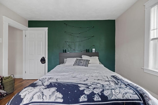 63-65 Brookley Rd Unit 3, Boston, MA 02130 - bedroom featuring wood finished floors and multiple windows