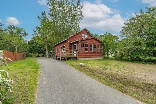 164 Leonard St, Agawam, MA 01001 - rustic home with driveway and a chimney