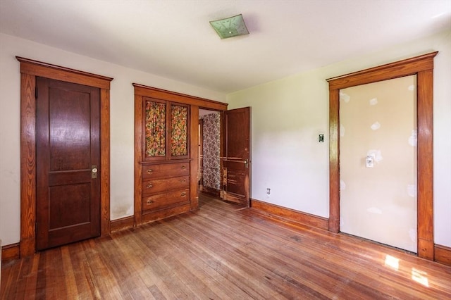 164 Leonard St, Agawam, MA 01001 - unfurnished bedroom with wood finished floors and baseboards
