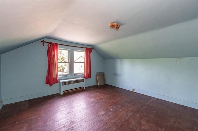 164 Leonard St, Agawam, MA 01001 - additional living space with radiator heating unit, vaulted ceiling, hardwood / wood-style floors, and baseboards