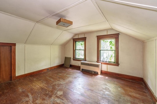 164 Leonard St, Agawam, MA 01001 - additional living space with radiator, lofted ceiling, and wood-type flooring