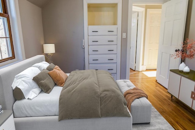 bedroom with light hardwood / wood-style flooring