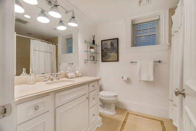 bathroom featuring visible vents, toilet, ornamental molding, baseboards, and vanity