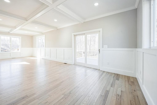1 Falcon Dr, Shrewsbury, MA 01545 - unfurnished room featuring a decorative wall, light wood finished floors, beam ceiling, a wainscoted wall, and coffered ceiling