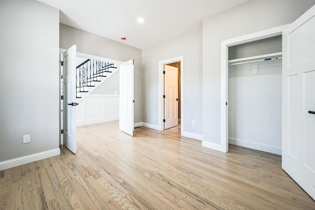 1 Falcon Dr, Shrewsbury, MA 01545 - unfurnished bedroom featuring light wood-style floors and a closet