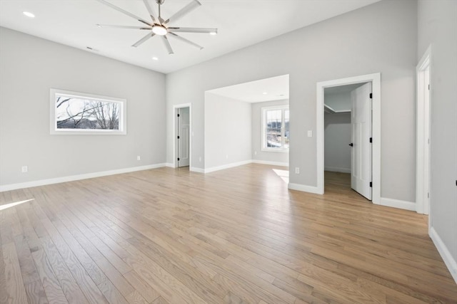 1 Falcon Dr, Shrewsbury, MA 01545 - unfurnished living room with light wood finished floors, recessed lighting, and a ceiling fan