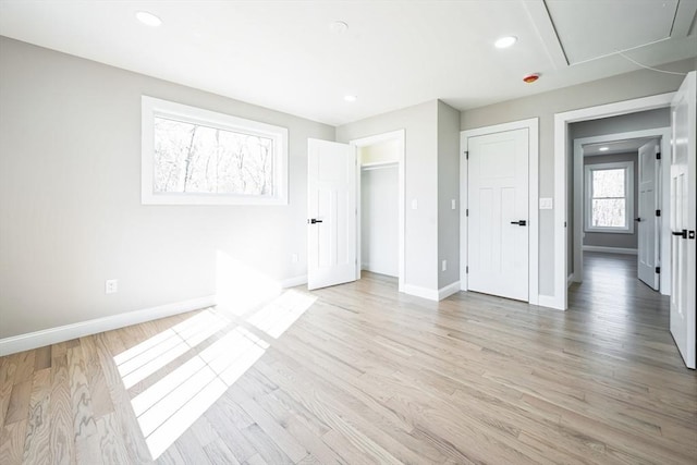 1 Falcon Dr, Shrewsbury, MA 01545 - unfurnished bedroom with attic access, light wood-type flooring, recessed lighting, and a closet