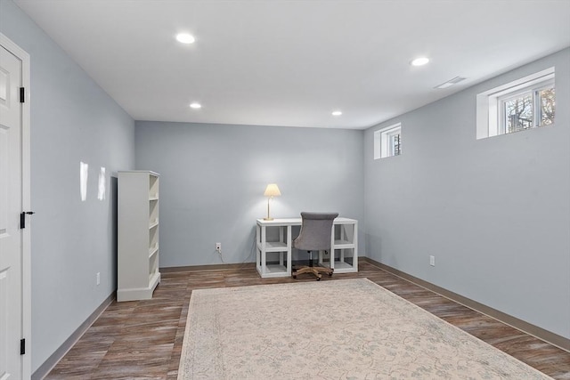 office space featuring dark wood-type flooring