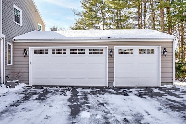 view of snow covered garage