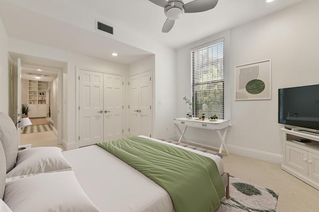 bedroom featuring visible vents, baseboards, ceiling fan, light colored carpet, and recessed lighting