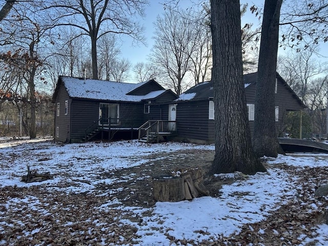 view of snow covered house