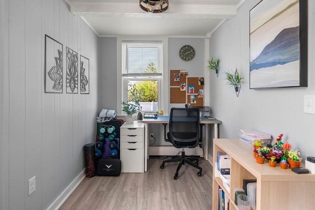 office space featuring crown molding and wood finished floors