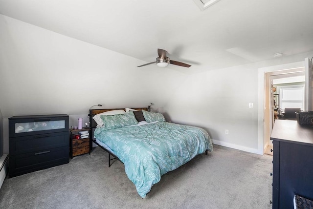 bedroom featuring baseboards, a ceiling fan, and light carpet