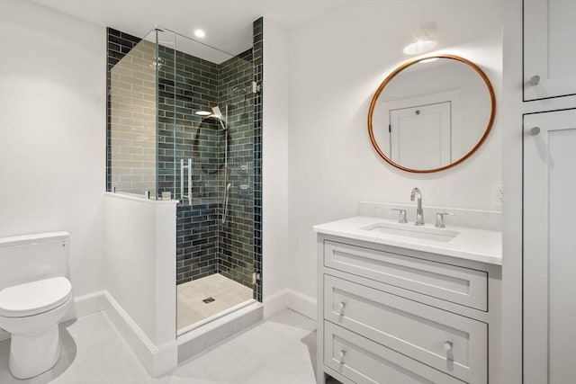 full bathroom with baseboards, toilet, tile patterned floors, vanity, and a shower stall