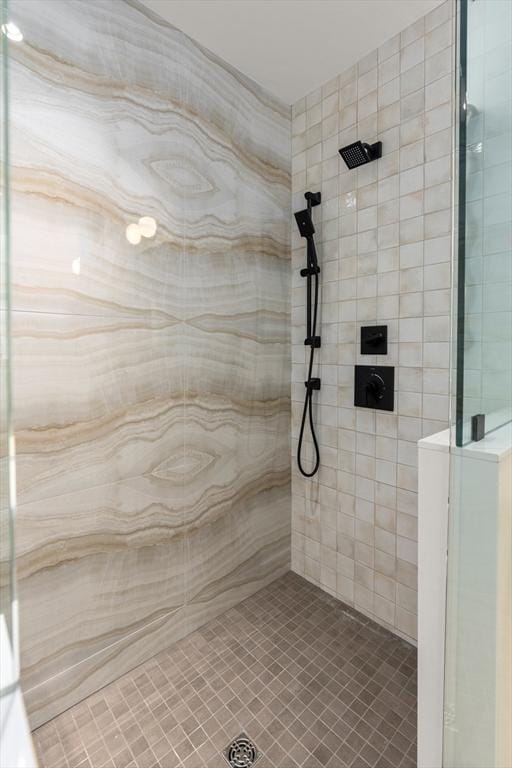 59 Mason Ter Unit 59, Brookline, MA 02446 - bathroom featuring tiled shower