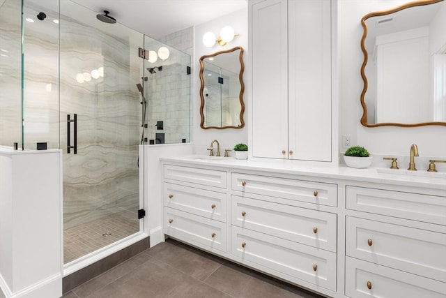 59 Mason Ter Unit 59, Brookline, MA 02446 - full bathroom with double vanity, a stall shower, and tile patterned floors