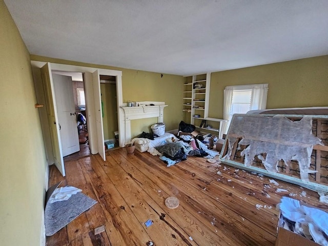 bedroom with wood-type flooring