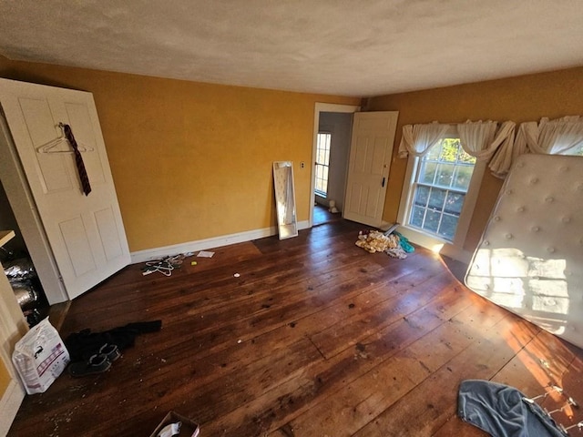 empty room featuring dark hardwood / wood-style floors