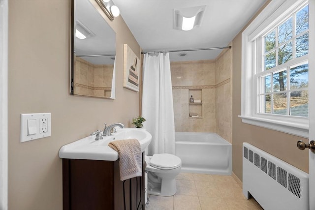 bathroom with toilet, radiator heating unit, shower / tub combo, vanity, and tile patterned floors