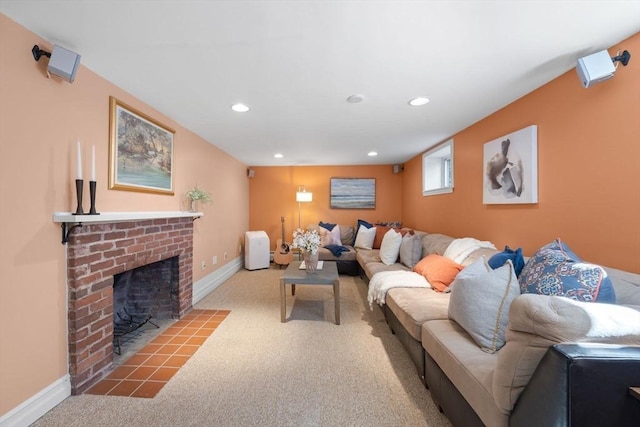 carpeted living room with a fireplace, baseboards, and recessed lighting