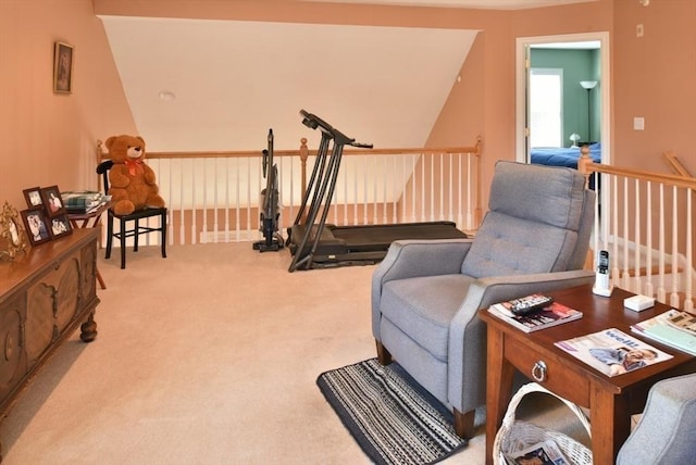 living area with light colored carpet