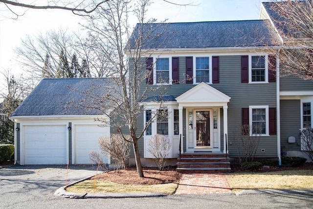 colonial home featuring a garage