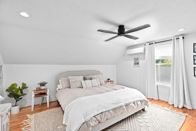 30 Highland St, Abington, MA 02351 - bedroom with a wall mounted air conditioner, light wood finished floors, vaulted ceiling, a ceiling fan, and recessed lighting