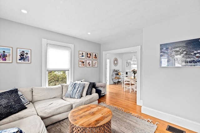 30 Highland St, Abington, MA 02351 - living area featuring light wood finished floors, recessed lighting, and baseboards