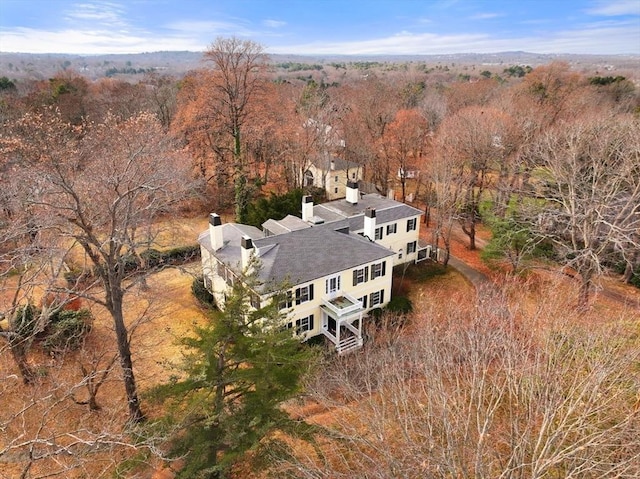 view from above of property featuring a forest