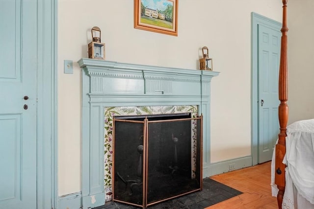 bedroom view of a high end fireplace