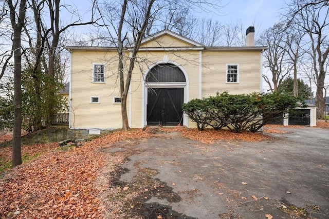 view of front of property with a chimney