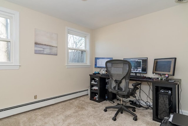 carpeted home office with a baseboard radiator