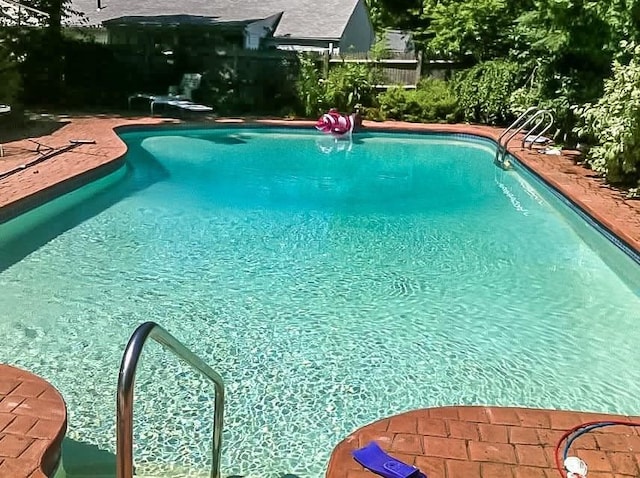 view of pool featuring a fenced in pool