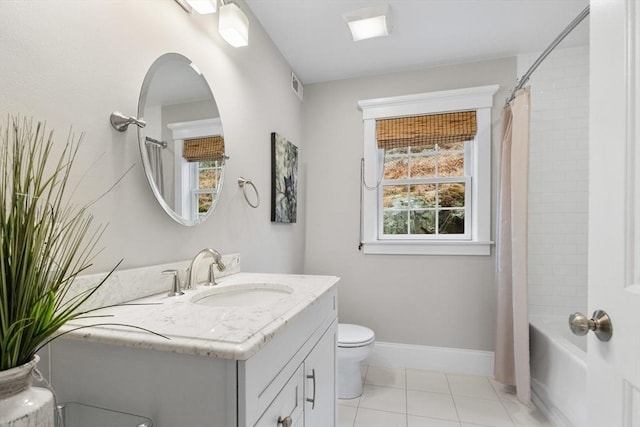 bathroom featuring visible vents, baseboards, toilet, tile patterned floors, and vanity