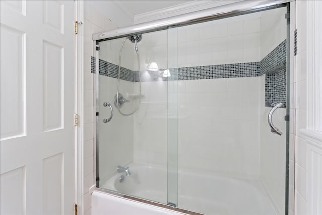 bathroom with enclosed tub / shower combo and crown molding