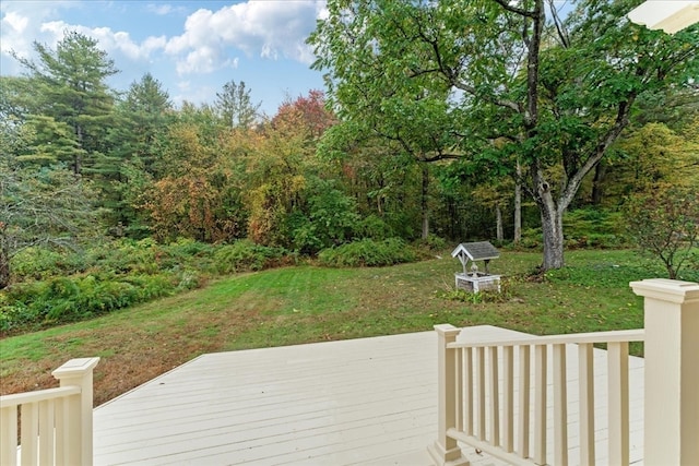 wooden deck with a yard