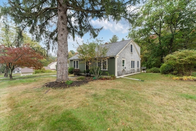 exterior space with a front lawn