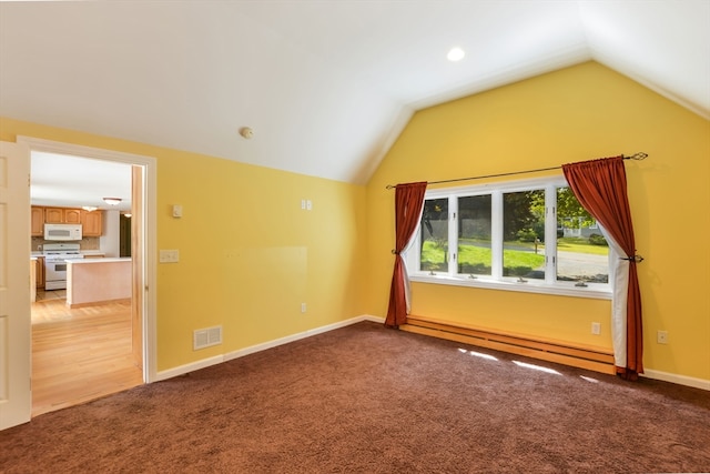 bonus room with a baseboard radiator, vaulted ceiling, and carpet floors