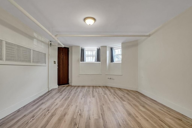 spare room with light wood-type flooring