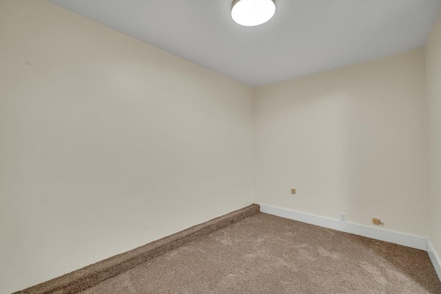 unfurnished room with carpet floors