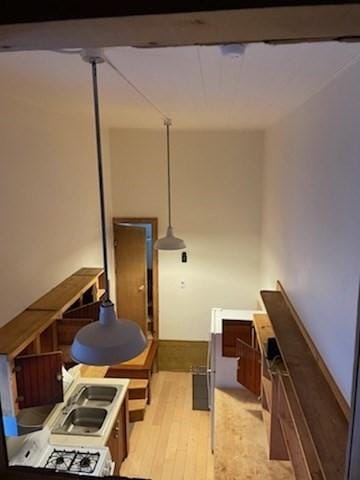 165 Main St, Charlemont, MA 01339 - kitchen featuring light wood finished floors and a sink
