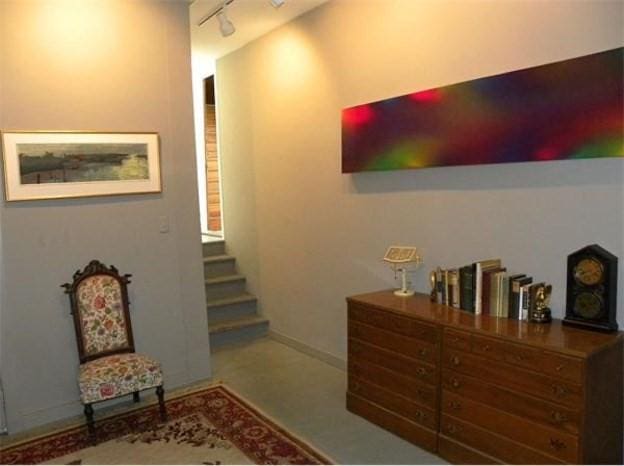 165 Main St, Charlemont, MA 01339 - sitting room featuring rail lighting, stairs, and baseboards