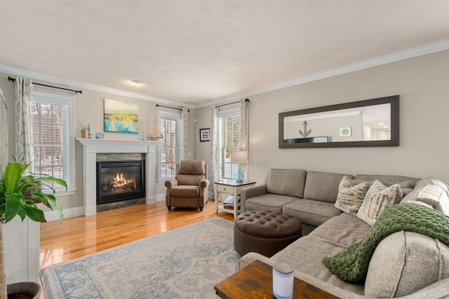 living room with ornamental molding and wood-type flooring