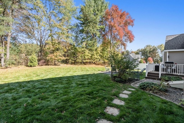 view of yard with a deck