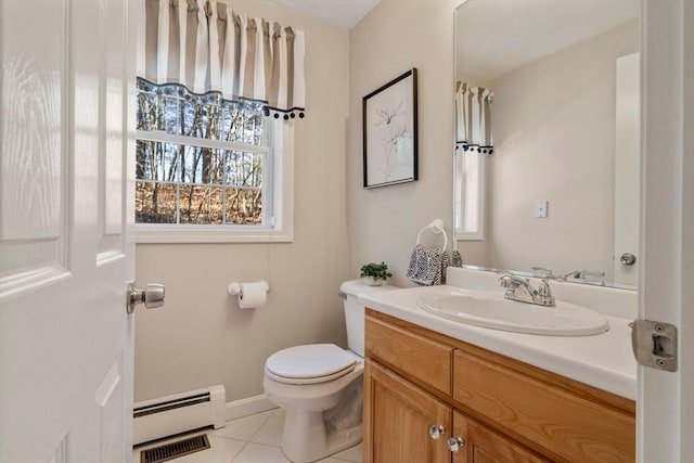 bathroom with visible vents, toilet, a baseboard radiator, tile patterned flooring, and vanity