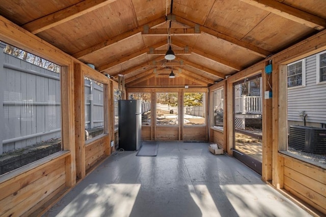 sunroom featuring wooden ceiling and vaulted ceiling