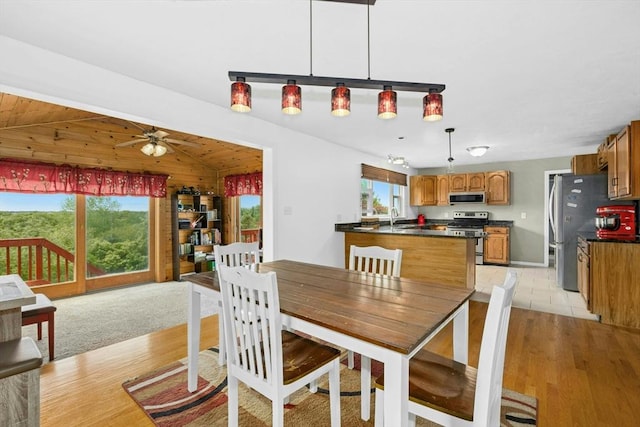 25 Piasta Rd, Dudley, MA 01571 - dining space featuring light wood-style flooring, ceiling fan, and lofted ceiling
