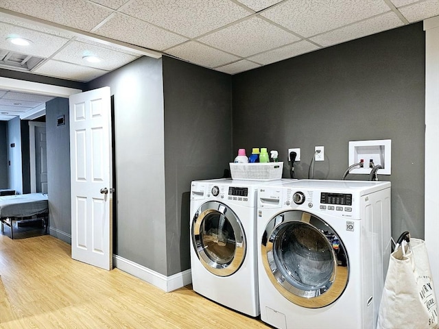 20 Upland Rd, Marlborough, MA 01752 - laundry room featuring light wood-style floors and washing machine and clothes dryer